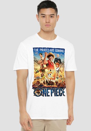 White cotton t-shirt featuring a colorful graphic print of characters and scenes from "One Piece," with the phrase "THE PIRATES ARE COMING."