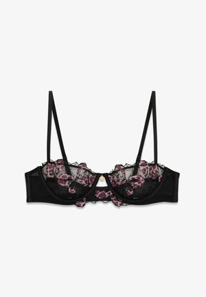 Zwarte doorschijnende beugel BH met roze bloemenkant borduursel en dunne verstelbare bandjes.