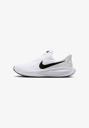 White athletic sneaker with a mesh upper, black Nike Swoosh logo, slip-on design, padded heel, and a textured white sole.
