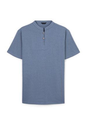 Chemise bleu à manches courtes de style henley avec col rond et patte de boutonnage à trois boutons. Fabriquée en tissu texturé avec une coupe décontractée.