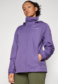 Purple waterproof jacket with a high collar, adjustable hood, and elastic cuffs. Features a front zip closure and side pockets for storage.