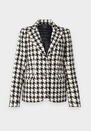 Wool blend blazer in black and white houndstooth pattern. Features a fitted design, notched lapels, and two front pockets. Two-button closure.