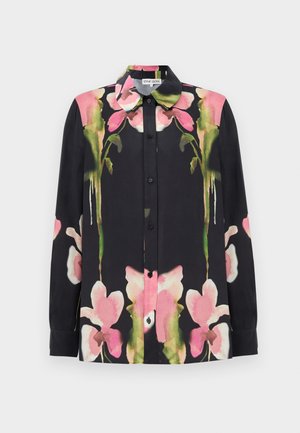 Black shirt with pink and green floral print, featuring a pointed collar, button front, and long sleeves. Smooth fabric with slight sheen.