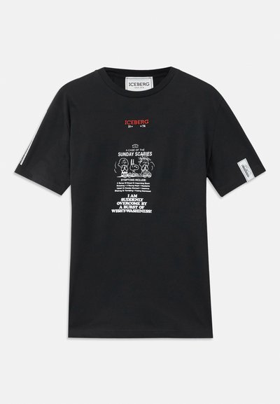 Black cotton t-shirt featuring a graphic print with red and white text. Short sleeves with a tag on the side. Casual fit, round neckline.
