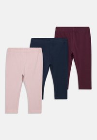 Tres pares de leggings lisos con cintura elástica en rosa claro, azul marino y burdeos oscuro, dispuestos de manera superpuesta sobre un fondo blanco.