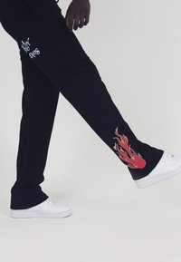 LEGACY STUDIOS ORION UNISEX - Treniņtērpa apakšdaļas - black