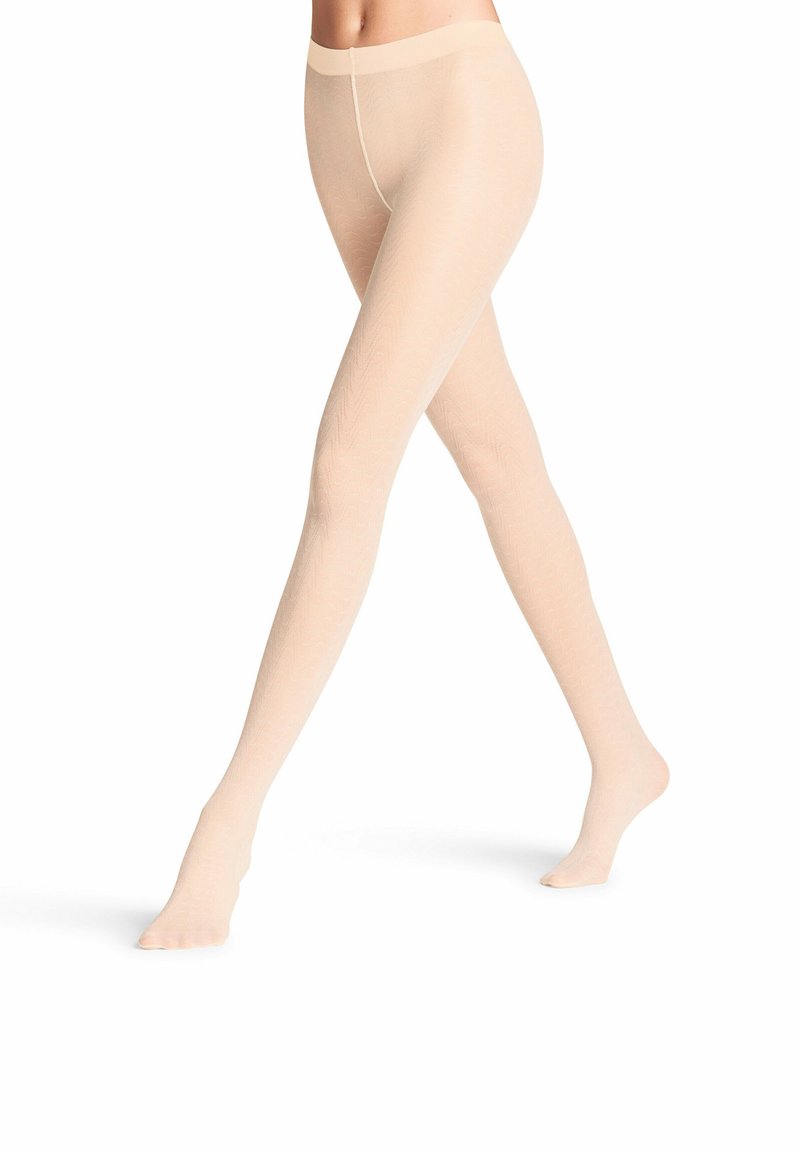 Beige strukturierte Strumpfhosen mit einem dezenten Muster, einem breiten Bündchen und einer glatten Oberfläche, die für Komfort und Passform entwickelt wurden.