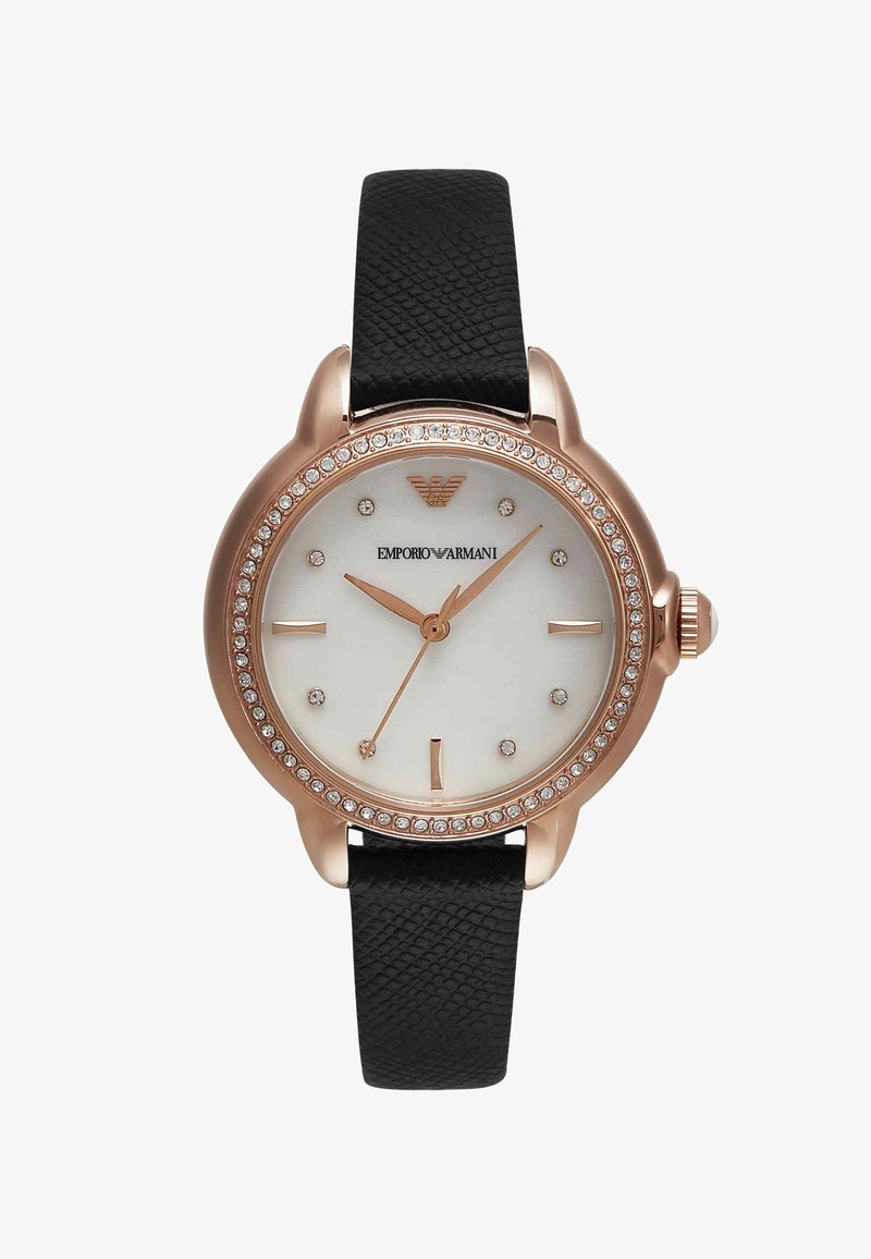 Rose gold watch with crystal bezel, white dial, minimal markers, Emporio Armani logo, and textured black leather strap.