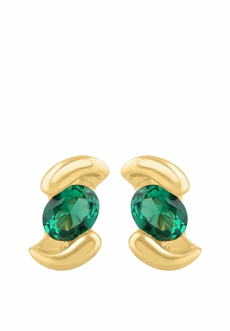 Náušnice v zlatej farbe s oválnymi zelenými drahokamami, obklopené hladkými, zakrivenými kovovými detailmi. Leštený povrch s odrazivými plochami.