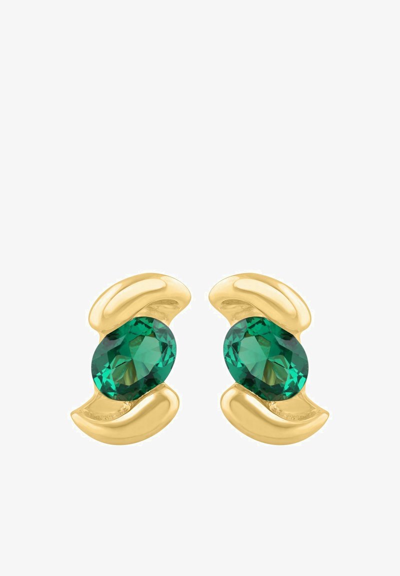 Náušnice v zlatej farbe s oválnymi zelenými drahokamami, obklopené hladkými, zakrivenými kovovými detailmi. Leštený povrch s odrazivými plochami.