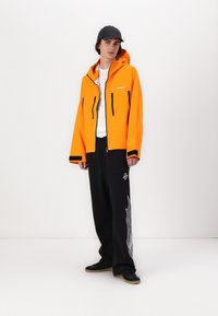 LOW LIGHTS STUDIOS® ORION TECH JACKET UNISEX - Lett jakke - orange