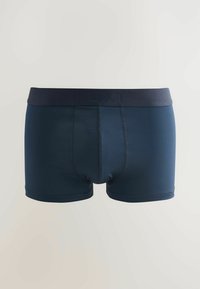 Boxer da uomo blu navy con vita elastica nera e nome del marchio "NEXT" in rilievo su uno sfondo chiaro.