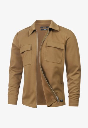 Braunes Hemd zum Reißverschluss aus strukturiertem Stoff, mit Kragen, zwei Brusttaschen, langen Ärmeln und geradem Schnitt.