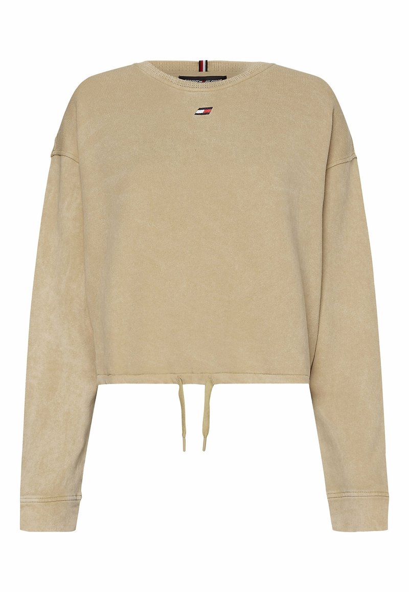 Sweat-shirt court beige à manches longues, avec cordon de serrage à l'ourlet et petit logo rectangulaire rouge, blanc et marine au centre de la poitrine.