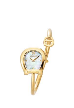 Reloj de pulsera Aigner dorado con caja en forma de herradura, esfera de nácar, marcadores mínimos y correa delgada estilo brazalete dorada con cierre de hebilla.