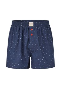 Marineblaue Herrenboxershorts mit hellblauen Polka Dots, elastischem Bund, zwei roten Knöpfen und einem beigen Markenetikett in der Mitte.