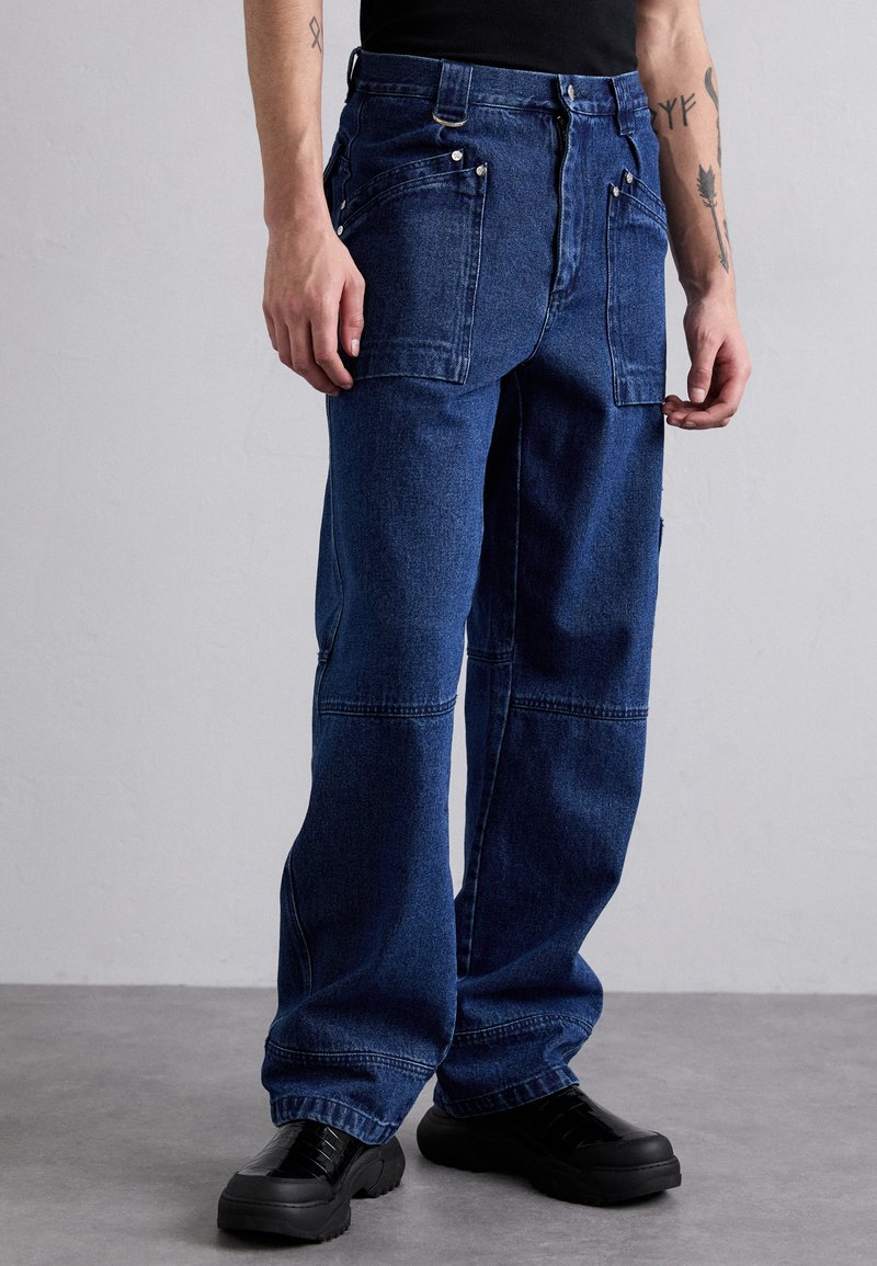 GmbH WORKWEAR TROUSERS - Relaxed fit jeans - indigo