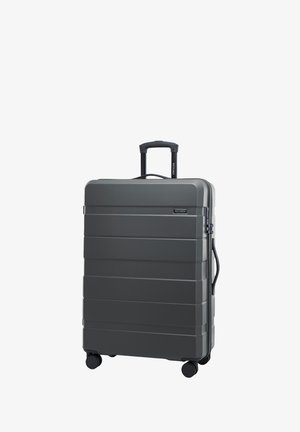 Šedý tvrdý kufr s vertikálními rýhami, teleskopickou rukojetí a čtyřmi otočnými koly. Disponuje zámkem a texturovaným povrchem.