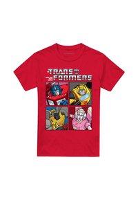 Red cotton t-shirt featuring four comic-style panels with Transformers characters. Graphic design includes vibrant colors and detailed illustrations.