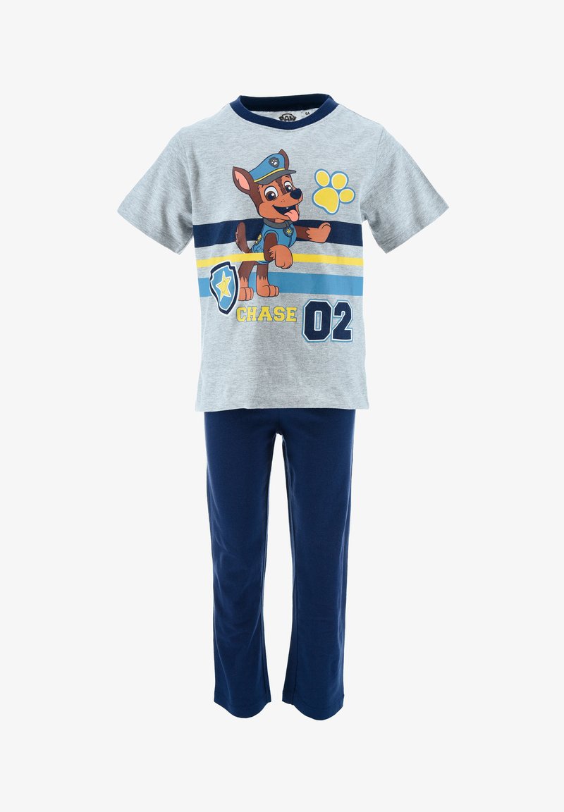 Grijze katoenen t-shirt met een cartoonhond met blauwe en gele strepen. Gekocht met donkerblauwe katoenen broek, beide in een zachte textuur.