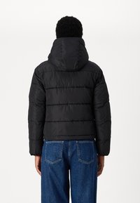Calvin Klein Jeans MATTE MONOLOGO PUFFER SHORT - Žieminė striukė - black