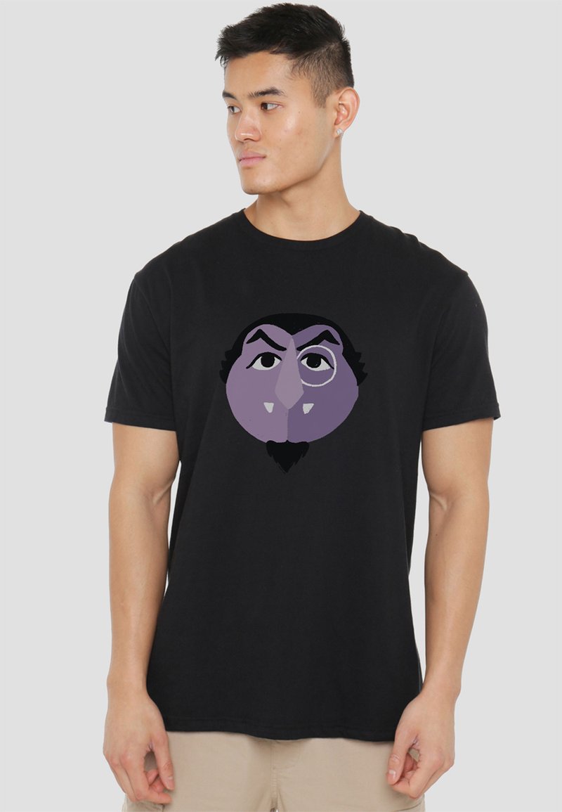 Schwarzes Baumwoll-T-Shirt mit einem großen lila Grafik eines Cartoon-Charakters, der ein spitzes Bart und einen schelmischen Ausdruck hat.