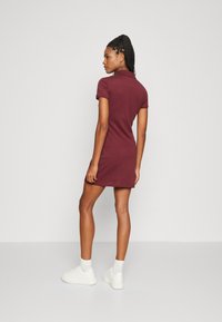 Lacoste Haljina od žerseja - zin