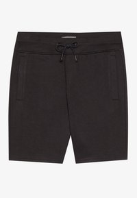 Pantaloni sportivi neri realizzati in un tessuto morbido, con vita elasticizzata a coste dotata di cordoncino e due tasche laterali.