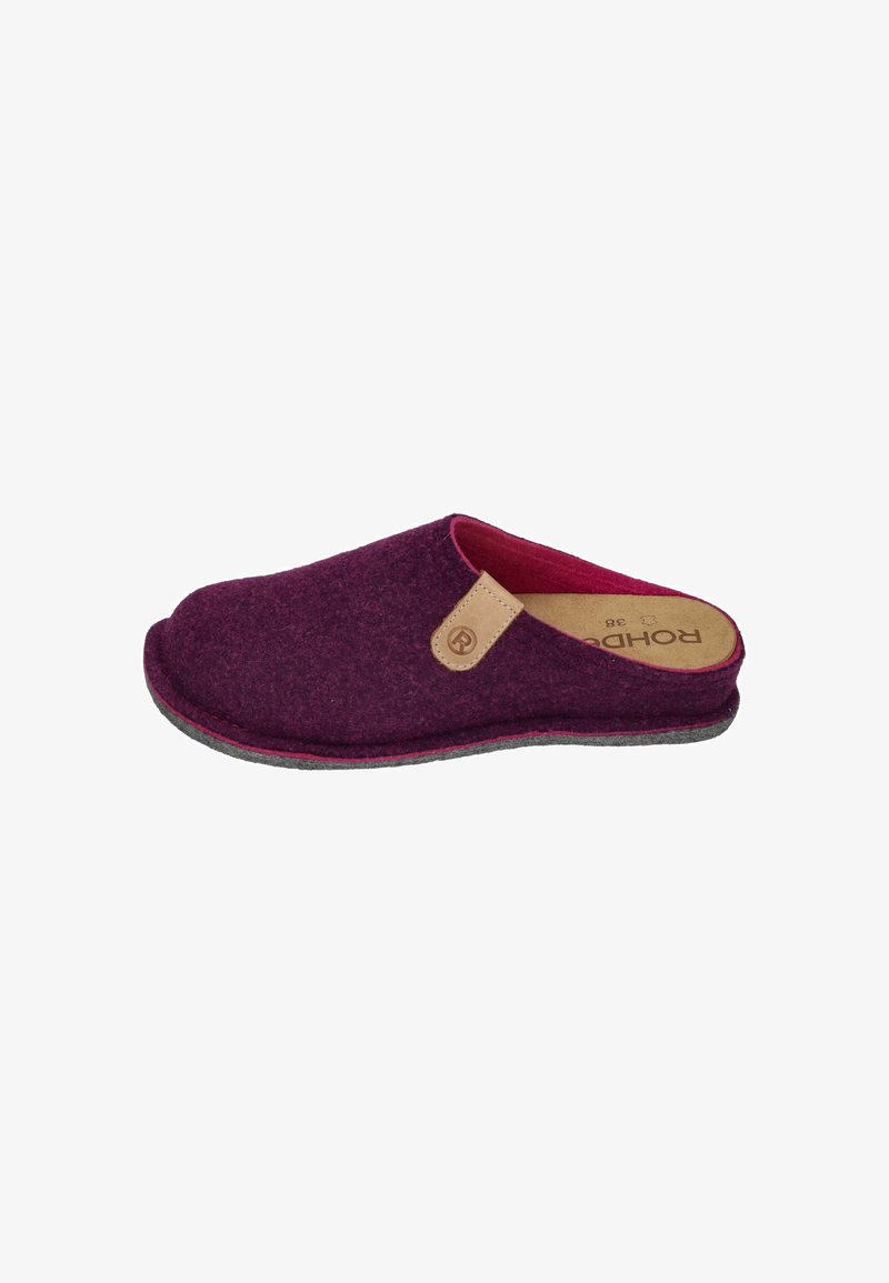Purple felt clogs with a soft texture, rounded shape, and a tan leather accent on the side. Grey outsole and pink interior lining.
