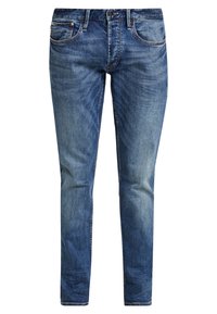 Blå denimjeans med smal passform, med en urblekt finish, femficksdesign och kontrastsömmar längs sömmarna.
