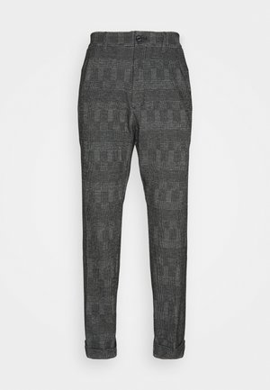 Gepatternde broek in zwart en grijs met ruitpatroon, gemaakt van stof met een gestructureerde afwerking. Opgerolde boorden en knoopsluiting in de taille.