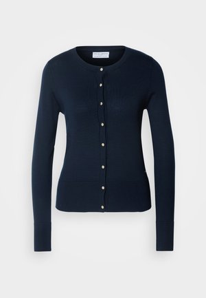 Cardigan tricotat de culoare bleumarin, cu mâneci lungi, manșete cu nervuri și front cu nasturi, având nasturi mici de culoare aurie.
