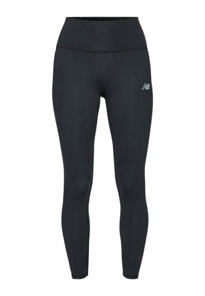 Leggings de sport noirs taille haute avec logo New Balance sur la partie supérieure de la cuisse gauche, conçus pour un ajustement près du corps.