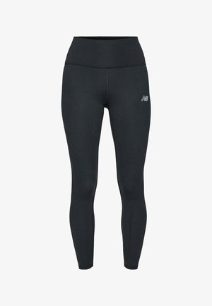 Leggings de sport noirs taille haute avec logo New Balance sur la partie supérieure de la cuisse gauche, conçus pour un ajustement près du corps.