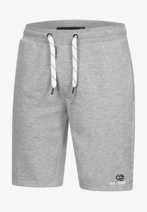 Szürke pamut rövidnadrág, zsinóros derékkal, fehér és piros csíkos díszítéssel, valamint egy kis hímzett logóval elöl.