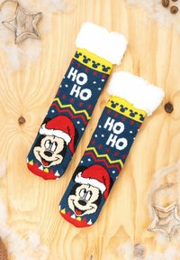 Calze blu con un personaggio dei cartoni animati, con una morbida cavigliera bianca, la scritta "HO HO" e motivi a zigzag colorati.