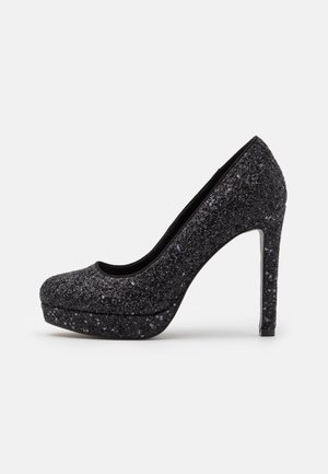 Black glitter high-heeled pump with a rounded toe, platform front, smooth black interior, and a sleek transparent heel.