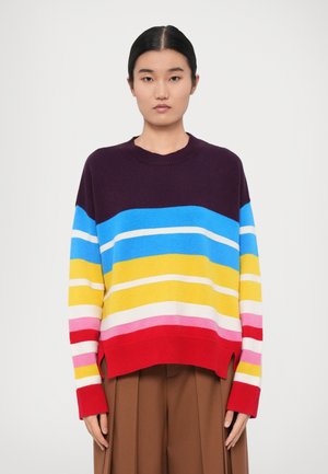 Multicolored striped sweater featuring purple, blue, yellow, pink, and red hues. Ribbed neckline and hem, with side slits for a relaxed fit.