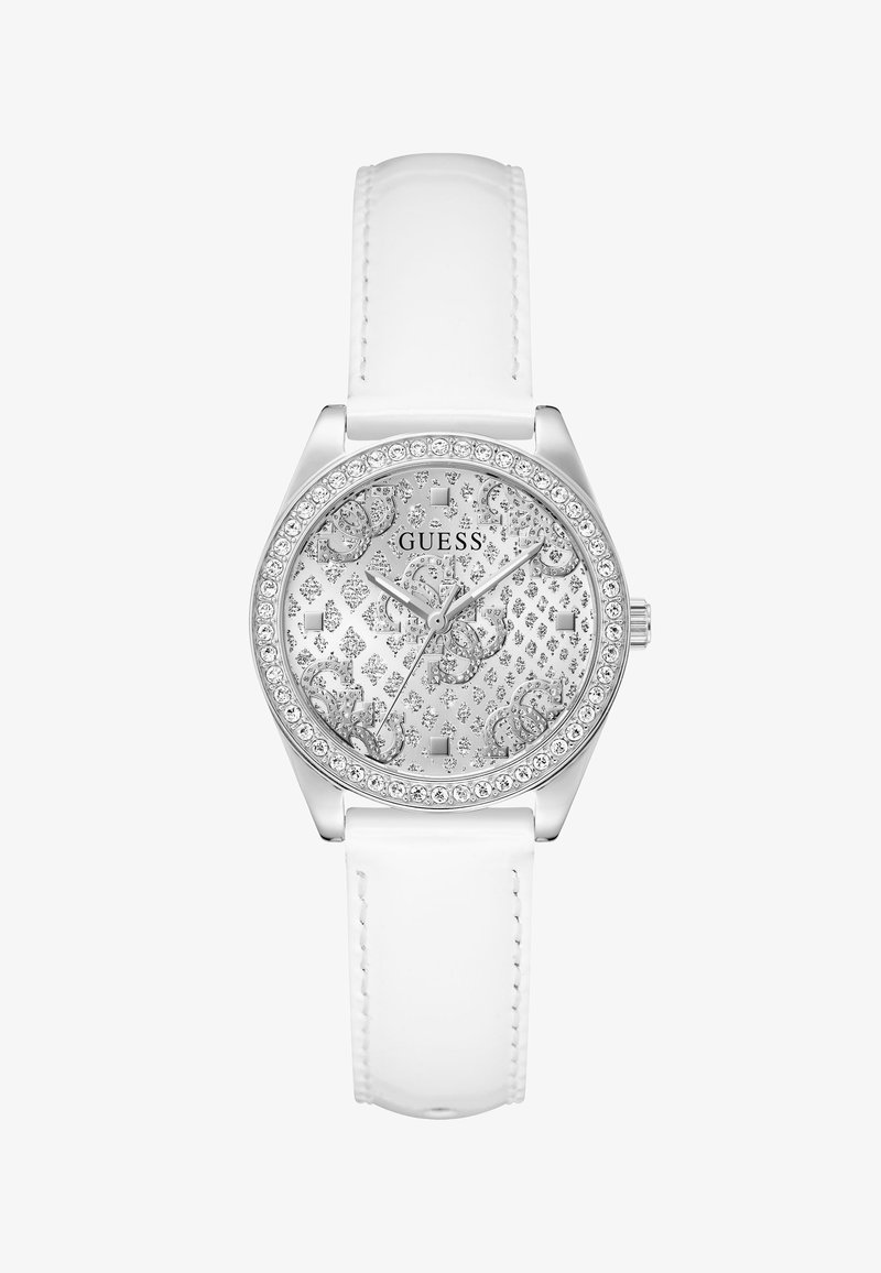 Tippelhető karóra fehér bőr szíjjal, ezüst színű számlappal, csillogó mintákkal, kristályoztott kerettel, valamint ezüst színű óra, perc és másodperc mutatókkal.