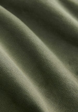 Olive green fabric with a smooth texture, featuring subtle ridges and waves, showcasing a lightweight, stretchy material.