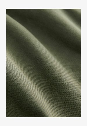 Olive green fabric with a smooth texture, featuring subtle ridges and waves, showcasing a lightweight, stretchy material.