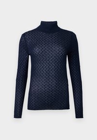 Maglia a maniche lunghe a collo alto color blu navy, realizzata in tessuto leggero e testurizzato con motivo a diamante e vestibilità aderente. Presenta un collo alto e aderente.