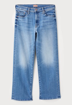 Lys blå denimjeans med rett benfôr, fem lommer og en falmet vask. Har metallhardware og en lærsøm-båndmerke.
