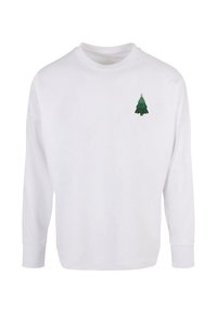 Fehér, hosszú ujjú pulóver, amelyen egy kis zöld karácsonyfás grafika látható csillaggal a bal mellkas részen. Pamut anyag, laza illeszkedéssel.