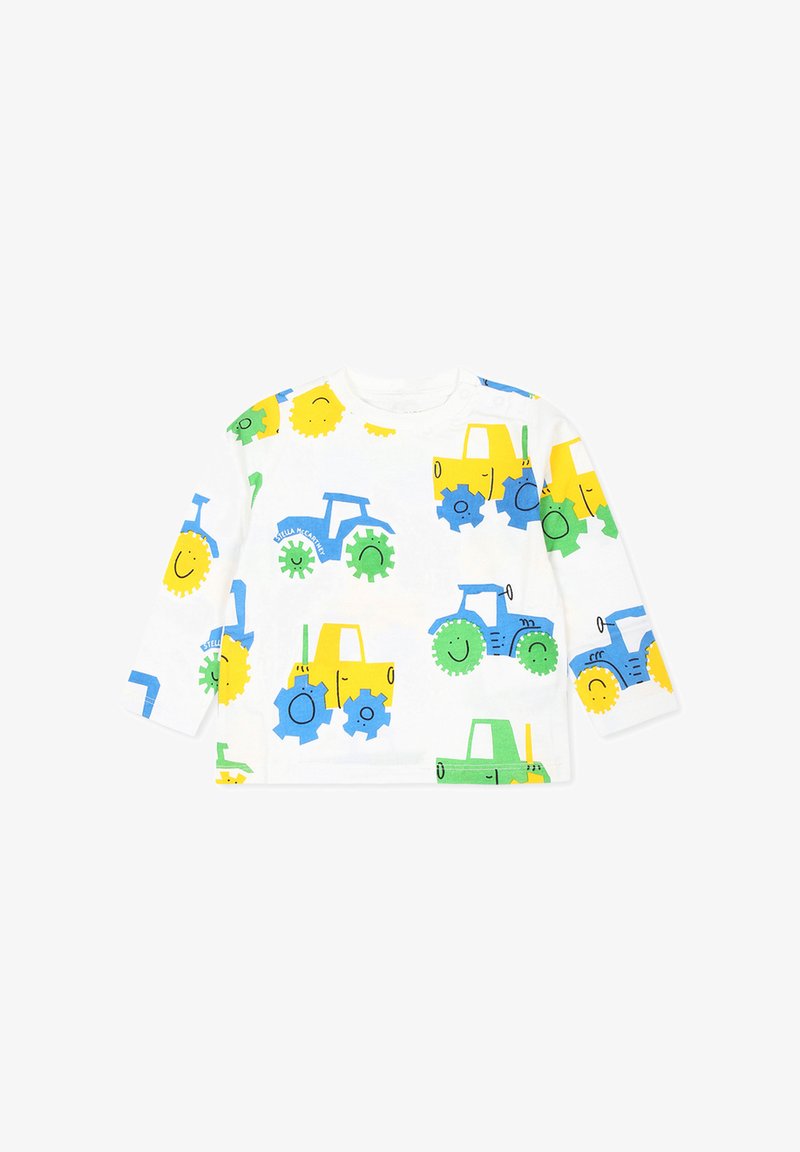 Camicia bianca a maniche lunghe con stampe di trattori colorati e ingranaggi in blu, verde, giallo e con disegni di sole sorridente; materiale in cotone morbido.