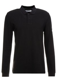 Černá polokošile s dlouhým rukávem, klasickým límcem, zapínáním na dvě knoflíky a texturovanou látkou; na rukávu se nachází decentní logo.