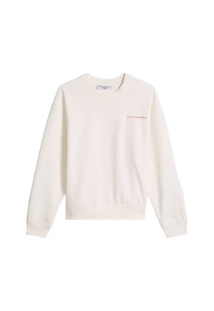 White crewneck sweatshirt with long sleeves and small red text on the left chest reading "by marcopoldedeno".