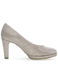 Sparkly beige high heel pump with a rounded toe and a textured fabric upper. Features a medium block heel and a cushioned insole.