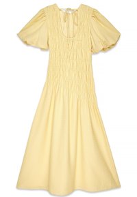 Robe smock jaune clair, dotée de manches courtes bouffantes, d'un décolleté carré et d'un tissu texturé. Comprend un lien au dos.