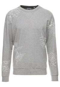 Felpa grigia in misto cotone con maniche lunghe. Presenta un ricamo floreale bianco sulla parte anteriore e uno scollo rotondo.